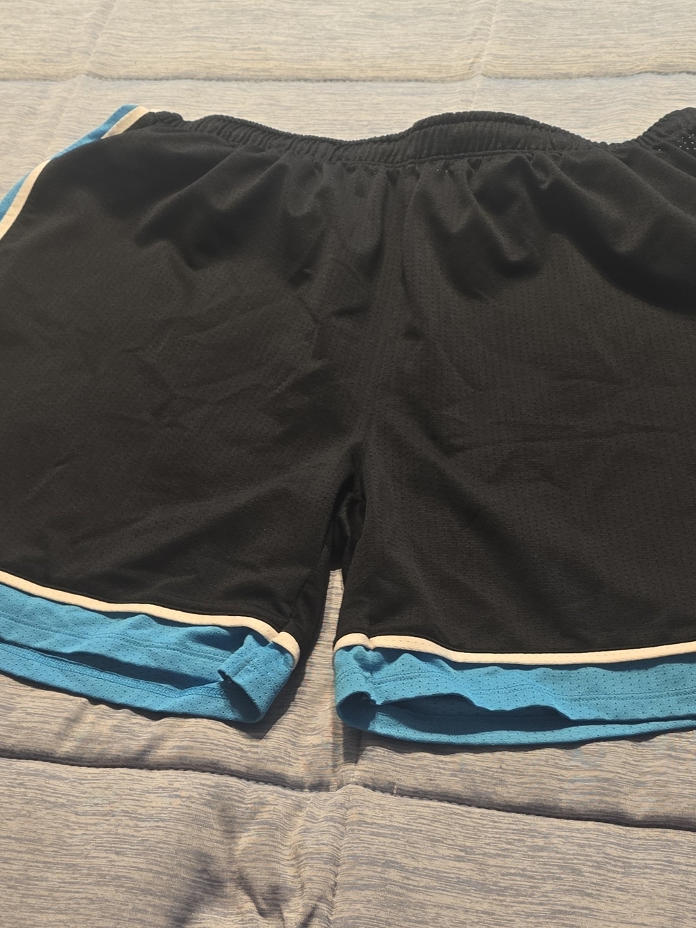 Under Armour Black Athletic Shorts with Light Blue and White Trim